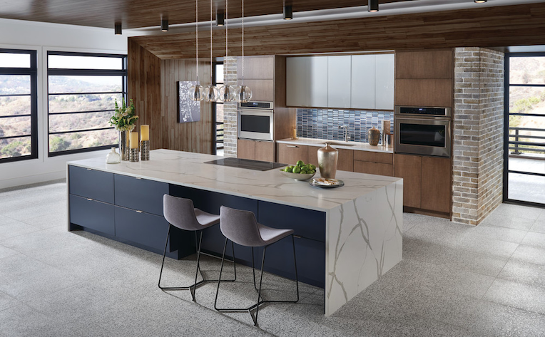 stone tile in earth-toned kitchen with marble island